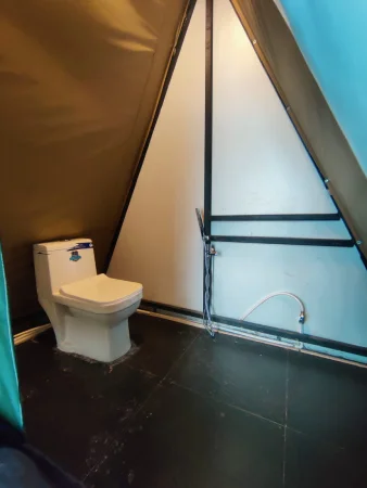 Tent with attached washroom